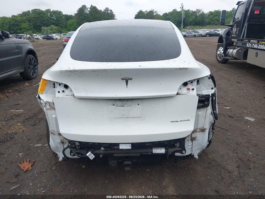 2021 Tesla Model y VIN 5YJYGAEE1MF130711 IAAI salvage auction — REAR END, Salvage Title, sold $8,100 on 2026-07-30 (photo 6)