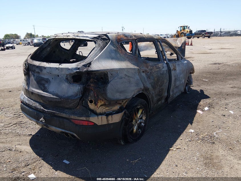 2013 Hyundai Santa fe VIN 5XYZU3LA4DG081084 IAAI salvage auction — TOTAL BURN, Salvage Title, sold $100 on 2026-07-22 (photo 4)