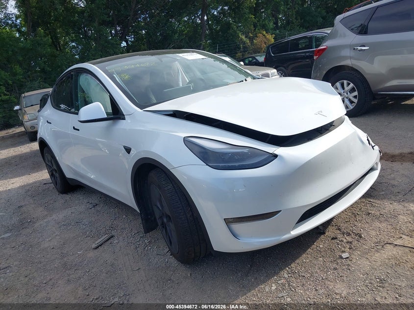 2024 Tesla Model y VIN 7SAYGAEE4RF201894 IAAI salvage auction — LEFT FRONT, Salvage (Indiana), sold $9,400 on 2026-07-11 (photo 1)