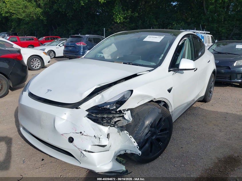 2024 Tesla Model y VIN 7SAYGAEE4RF201894 IAAI salvage auction — LEFT FRONT, Salvage (Indiana), sold $9,400 on 2026-07-11 (photo 2)