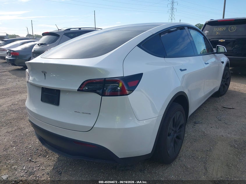 2024 Tesla Model y VIN 7SAYGAEE4RF201894 IAAI salvage auction — LEFT FRONT, Salvage (Indiana), sold $9,400 on 2026-07-11 (photo 4)