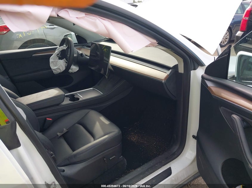 2024 Tesla Model y VIN 7SAYGAEE4RF201894 IAAI salvage auction — LEFT FRONT, Salvage (Indiana), sold $9,400 on 2026-07-11 (photo 5)