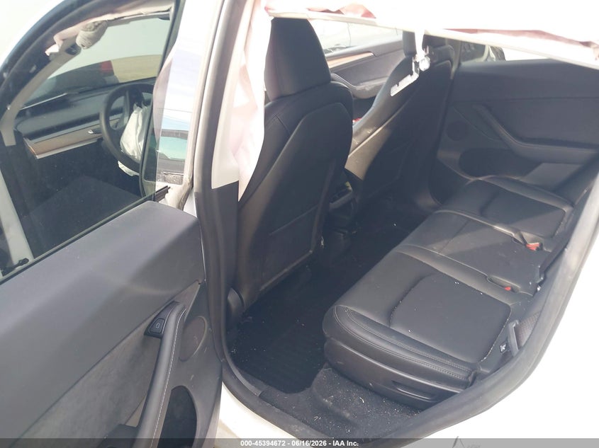 2024 Tesla Model y VIN 7SAYGAEE4RF201894 IAAI salvage auction — LEFT FRONT, Salvage (Indiana), sold $9,400 on 2026-07-11 (photo 8)