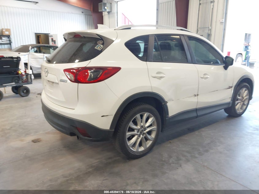 2015 Mazda Cx-5 VIN JM3KE4DY3F0554165 IAAI salvage auction — SIDE, Salvage (Colorado), sold $2,650 on 2026-08-29 (photo 4)