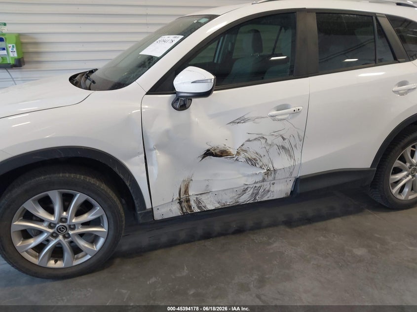 2015 Mazda Cx-5 VIN JM3KE4DY3F0554165 IAAI salvage auction — SIDE, Salvage (Colorado), sold $2,650 on 2026-08-29 (photo 6)
