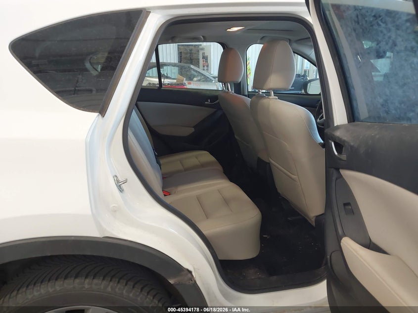 2015 Mazda Cx-5 VIN JM3KE4DY3F0554165 IAAI salvage auction — SIDE, Salvage (Colorado), sold $2,650 on 2026-08-29 (photo 8)