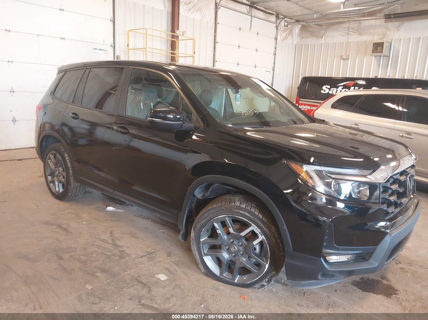 2023 Honda Passport VIN 5FNYF8H52PB003980 — IAAI salvage auction photo