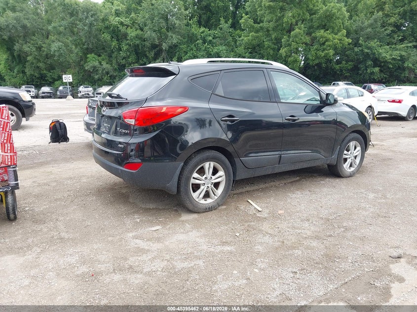 2012 Hyundai Tucson VIN KM8JUCAC5CU530248 IAAI salvage auction — NORMAL WEAR, Clear (Kansas), sold $750 on 2026-07-15 (photo 4)