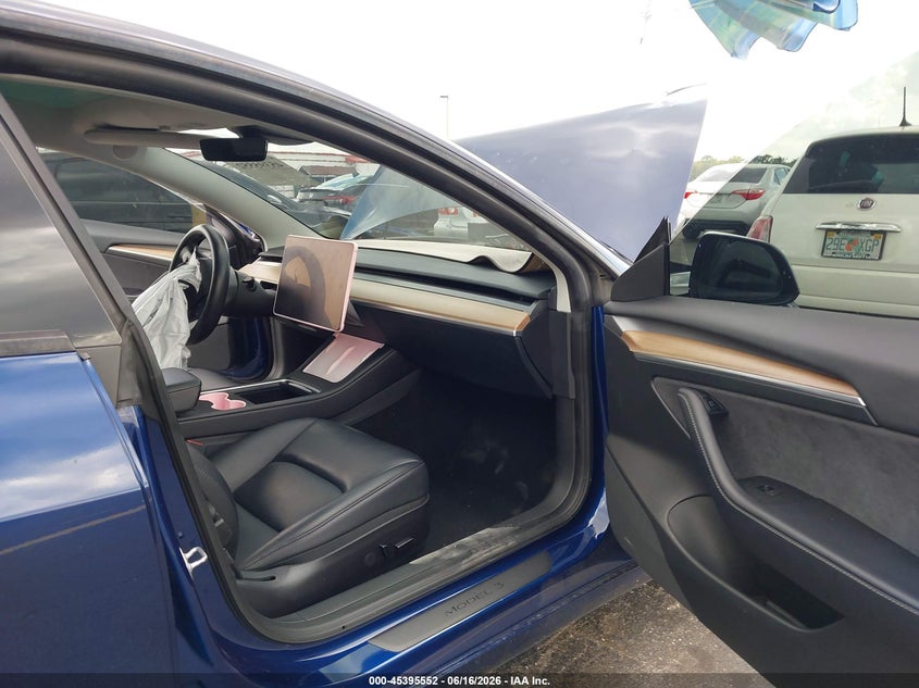 2023 Tesla Model 3 VIN 5YJ3E1EA1PF449222 IAAI salvage auction — FRONT END, Certificate Of Destruction (Florida), sold $4,000 on 2026-07-29 (photo 5)