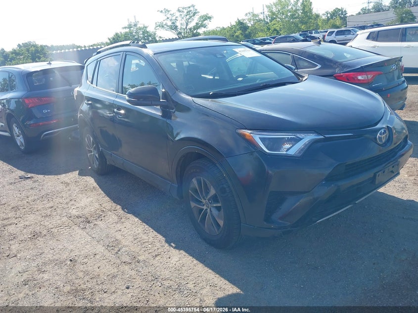 2018 Toyota Rav 4 VIN JTMRJREV0JD217202 IAAI salvage auction — REAR END, Mv-907A (New York), sold $2,750 on 2026-07-14 (photo 1)
