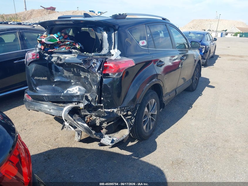 2018 Toyota Rav 4 VIN JTMRJREV0JD217202 IAAI salvage auction — REAR END, Mv-907A (New York), sold $2,750 on 2026-07-14 (photo 4)