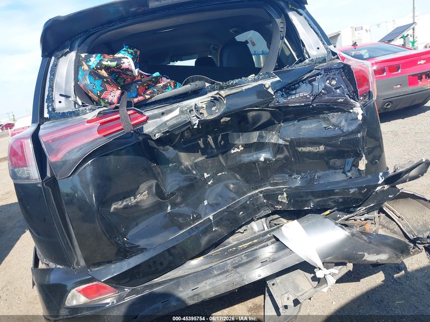 2018 Toyota Rav 4 VIN JTMRJREV0JD217202 IAAI salvage auction — REAR END, Mv-907A (New York), sold $2,750 on 2026-07-14 (photo 6)
