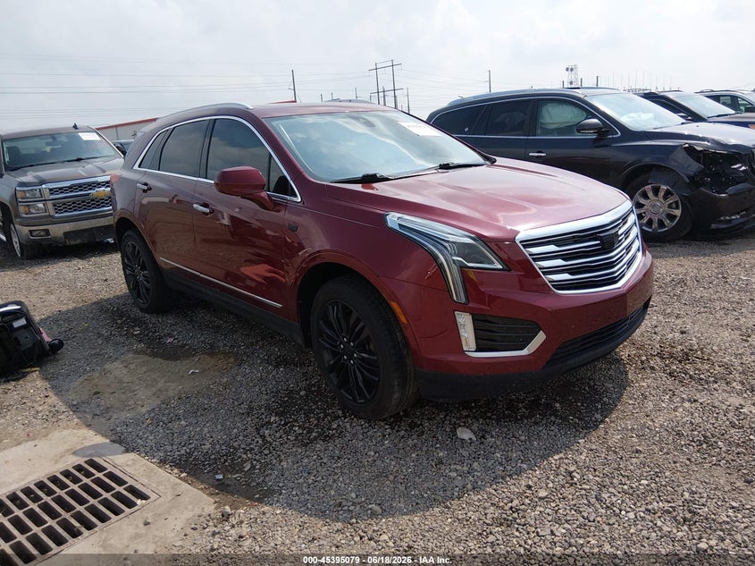 2018 Cadillac Xt5 VIN 1GYKNERS4JZ131015 IAAI salvage auction — SIDE, Salvage Title, sold $2,675 on 2026-09-09 (photo 1)