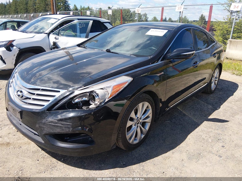 2013 Hyundai Azera VIN KMHFG4JGXDA245781 IAAI salvage auction — NORMAL WEAR, Clear (Washington), sold $550 on 2026-07-15 (photo 2)