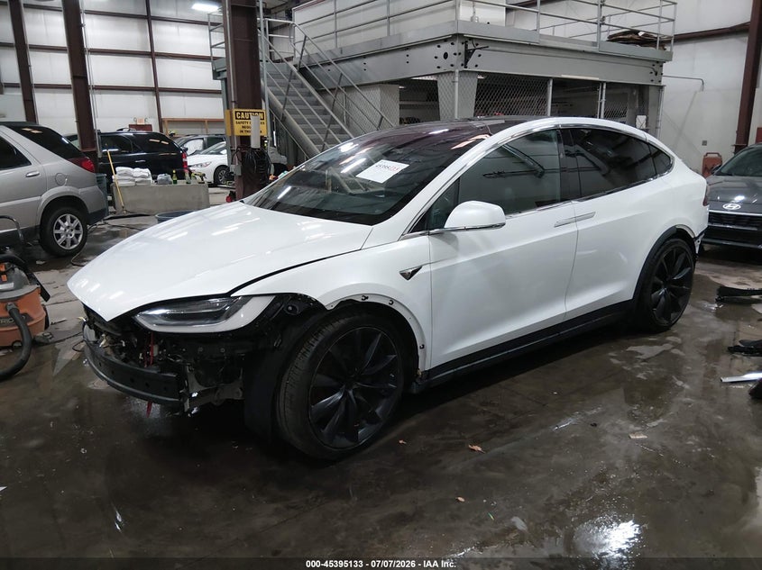 2018 Tesla Model x VIN 5YJXCDE23JF140599 IAAI salvage auction — FRONT & REAR, Salvage (Idaho), sold $7,900 on 2026-07-16 (photo 2)