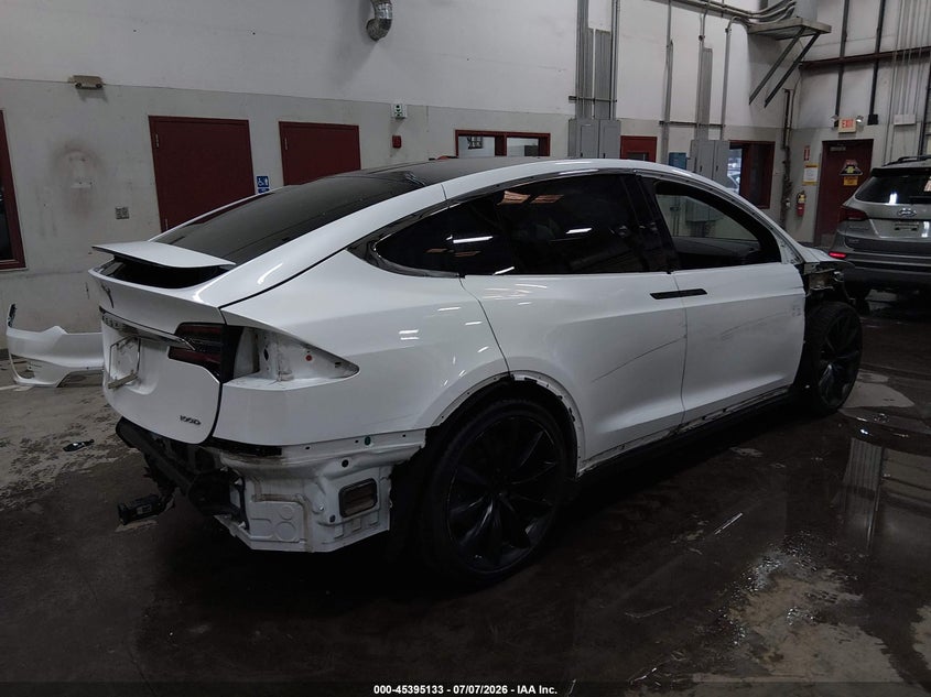 2018 Tesla Model x VIN 5YJXCDE23JF140599 IAAI salvage auction — FRONT & REAR, Salvage (Idaho), sold $7,900 on 2026-07-16 (photo 4)