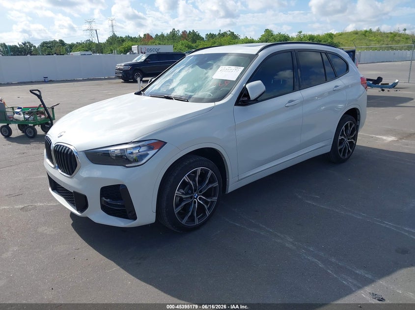 2021 BMW X1 VIN WBXJG7C07M5T84682 IAAI salvage auction — SIDE, Wait Title, sold $10,100 on 2026-08-21 (photo 2)