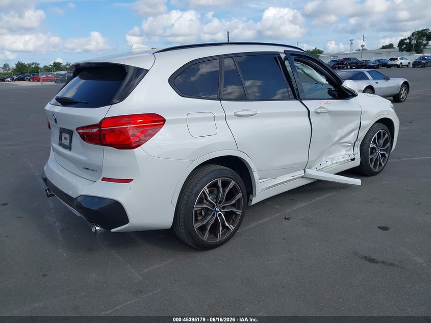 2021 BMW X1 VIN WBXJG7C07M5T84682 IAAI salvage auction — SIDE, Wait Title, sold $10,100 on 2026-08-21 (photo 4)