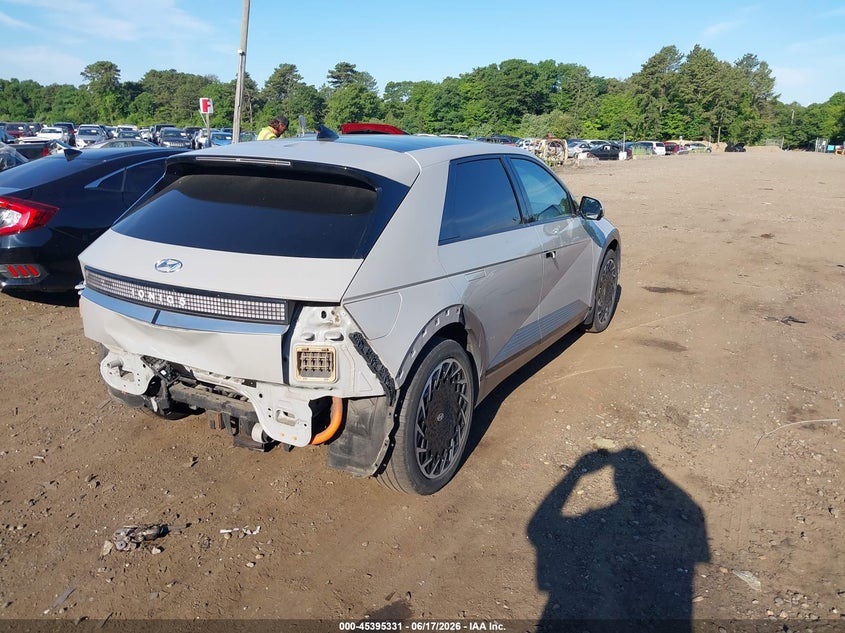 2022 Hyundai Ioniq 5 VIN KM8KRDAF5NU100681 IAAI salvage auction — FRONT & REAR, Mv-907A (New York), sold $9,375 on 2026-07-09 (photo 4)