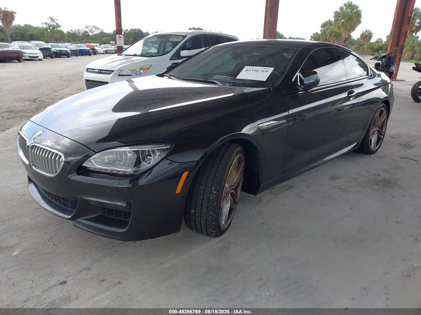 2014 BMW 6er VIN WBAYM9C50ED248278 IAAI salvage auction — NORMAL WEAR, Clear (Florida), sold $2,550 on 2026-07-14 (photo 2)