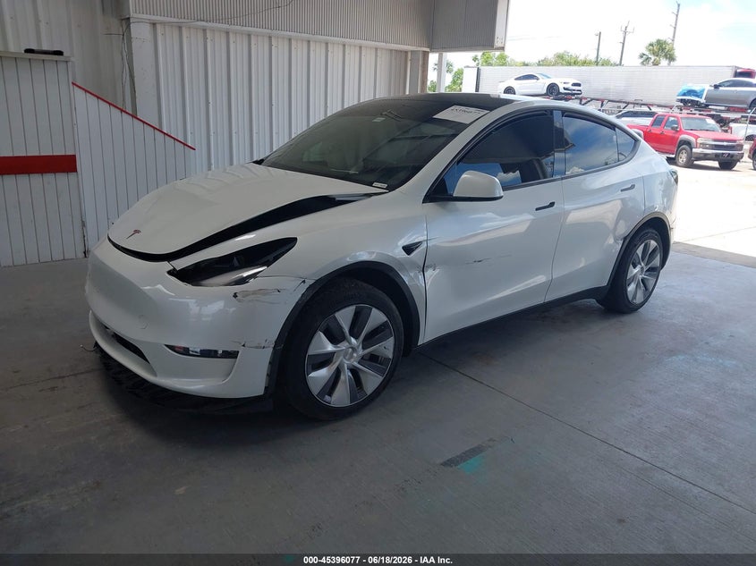 2023 Tesla Model y VIN 7SAYGDEE3PA096955 IAAI salvage auction — FRONT END, Salvage Title, sold $7,700 on 2026-07-23 (photo 2)
