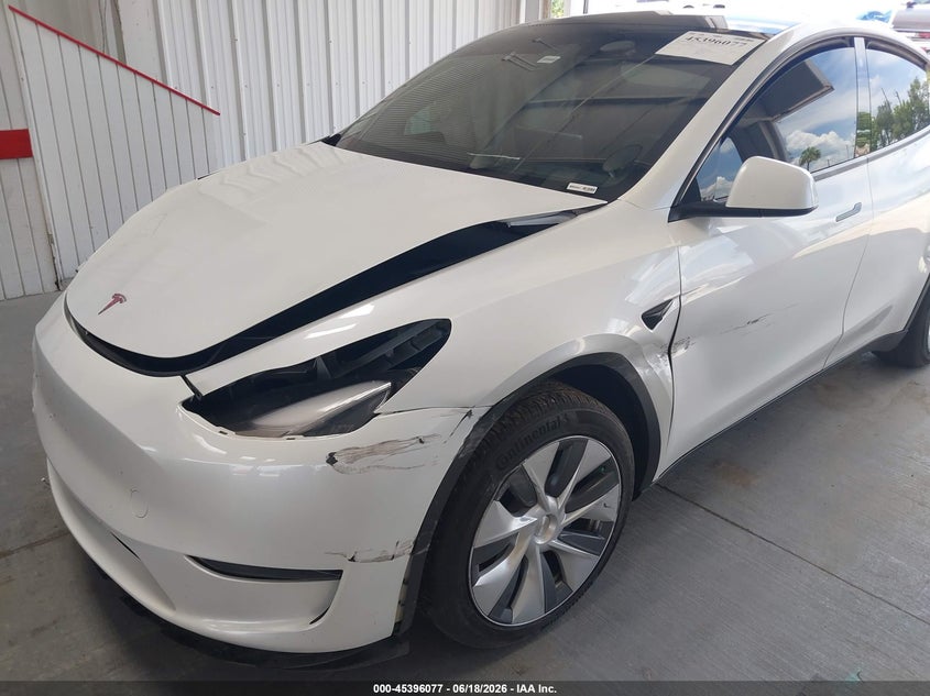 2023 Tesla Model y VIN 7SAYGDEE3PA096955 IAAI salvage auction — FRONT END, Salvage Title, sold $7,700 on 2026-07-23 (photo 6)