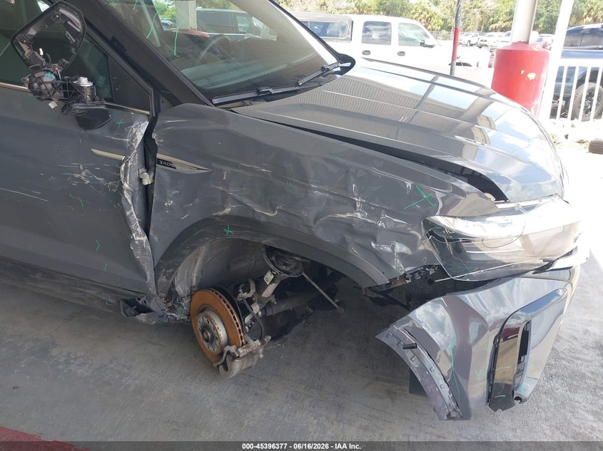 2024 Volkswagen Taos VIN 3VVEX7B23RM020456 IAAI salvage auction — UNDERCARRIAGE, Salvage Title, sold $7,700 on 2026-08-14 (photo 6)