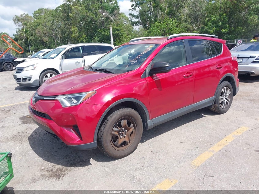 2016 Toyota Rav 4 VIN JTMZFREV3GJ099237 IAAI salvage auction — RIGHT SIDE, Rebuildable (Florida), sold $4,100 on 2026-07-13 (photo 2)
