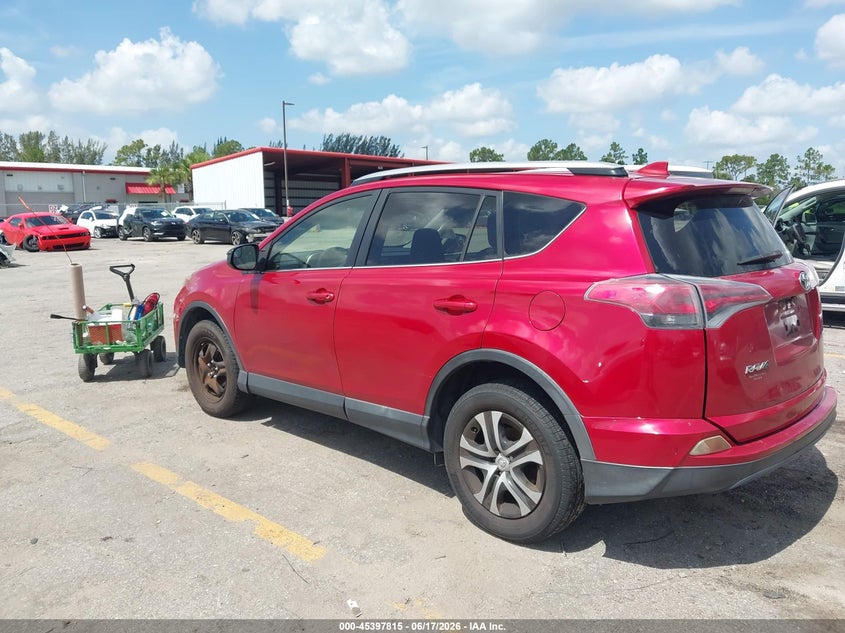 2016 Toyota Rav 4 VIN JTMZFREV3GJ099237 IAAI salvage auction — RIGHT SIDE, Rebuildable (Florida), sold $4,100 on 2026-07-13 (photo 3)