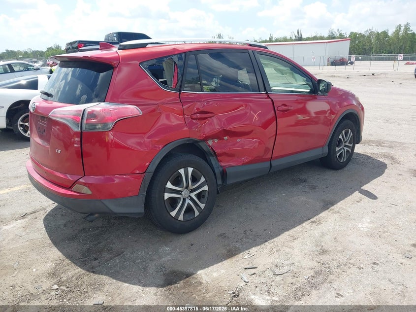 2016 Toyota Rav 4 VIN JTMZFREV3GJ099237 IAAI salvage auction — RIGHT SIDE, Rebuildable (Florida), sold $4,100 on 2026-07-13 (photo 4)