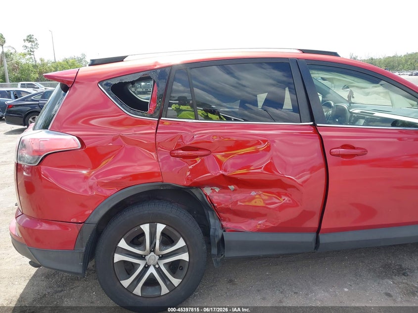 2016 Toyota Rav 4 VIN JTMZFREV3GJ099237 IAAI salvage auction — RIGHT SIDE, Rebuildable (Florida), sold $4,100 on 2026-07-13 (photo 6)