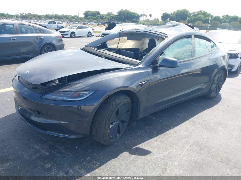 2025 Tesla Model 3 VIN 5YJ3E1EB4SF908258 IAAI salvage auction — ROLLOVER, Salvage Title, sold $4,650 on 2026-07-24 (photo 2)