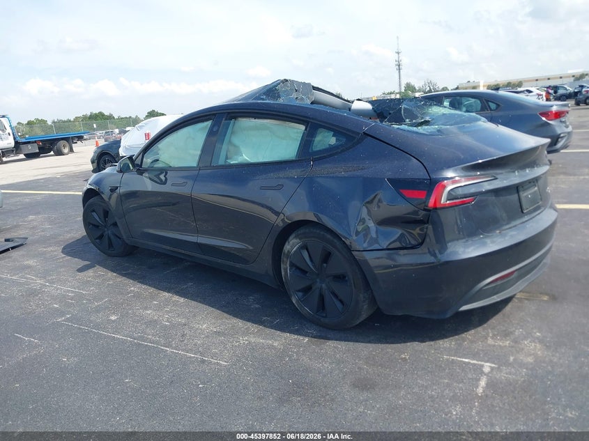 2025 Tesla Model 3 VIN 5YJ3E1EB4SF908258 IAAI salvage auction — ROLLOVER, Salvage Title, sold $4,650 on 2026-07-24 (photo 3)