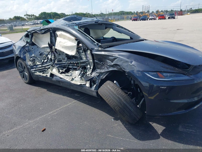 2025 Tesla Model 3 VIN 5YJ3E1EB4SF908258 IAAI salvage auction — ROLLOVER, Salvage Title, sold $4,650 on 2026-07-24 (photo 6)