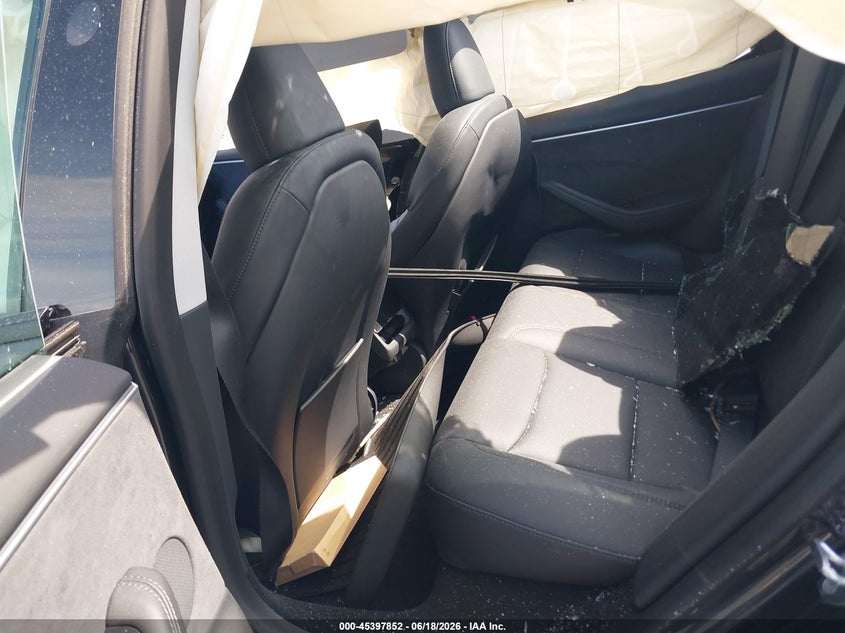 2025 Tesla Model 3 VIN 5YJ3E1EB4SF908258 IAAI salvage auction — ROLLOVER, Salvage Title, sold $4,650 on 2026-07-24 (photo 8)