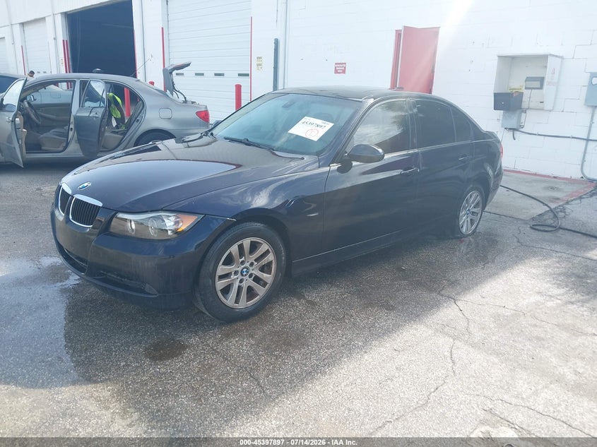 2007 BMW 3 series VIN WBAVC53567FZ74006 IAAI salvage auction — NORMAL WEAR, Clear (Florida), sold $25 on 2026-07-29 (photo 2)