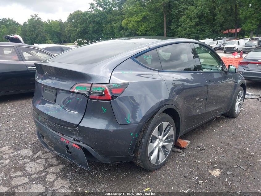 2023 Tesla Model y VIN 7SAYGDEE9PF710555 IAAI salvage auction — REAR END, Salvage (Georgia), sold $12,600 on 2026-07-29 (photo 6)