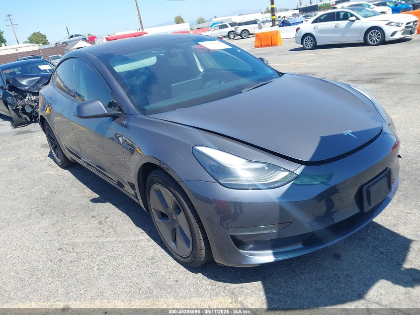 2023 Tesla Model 3 VIN 5YJ3E1EAXPF496412 — IAAI salvage auction photo
