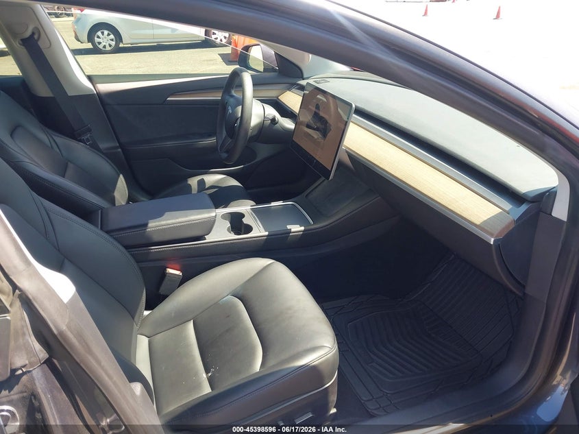 2023 Tesla Model 3 VIN 5YJ3E1EAXPF496412 IAAI salvage auction — REAR END, Salvage Title, sold $7,000 on 2026-07-29 (photo 5)