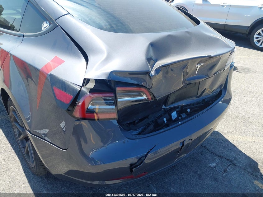 2023 Tesla Model 3 VIN 5YJ3E1EAXPF496412 IAAI salvage auction — REAR END, Salvage Title, sold $7,000 on 2026-07-29 (photo 6)