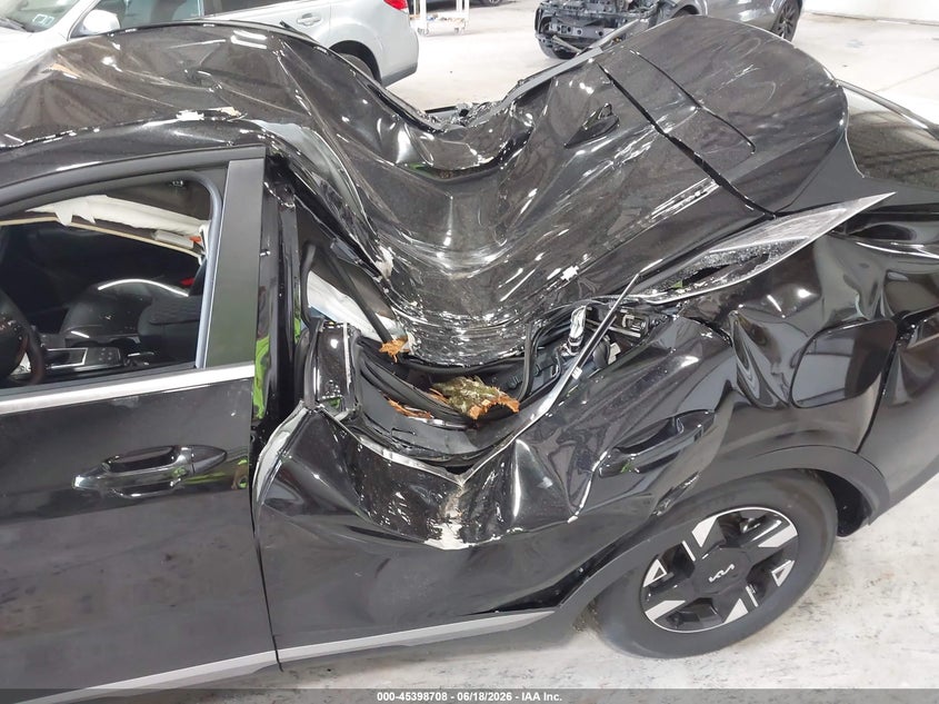 2026 Kia Sportage VIN KNDPUCDF2T7498894 IAAI salvage auction — STORM DAMAGE, Salvage Title, sold $4,300 on 2026-07-22 (photo 6)