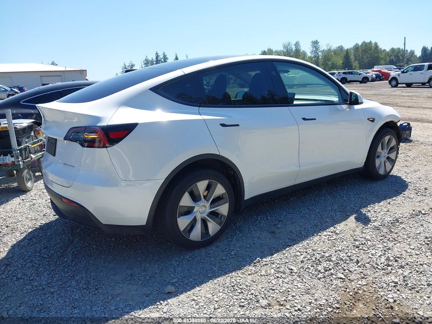 2023 Tesla Model y VIN 7SAYGDEE1PF825103 IAAI salvage auction — FRONT END, Salvage Title, sold $10,700 on 2026-07-16 (photo 4)