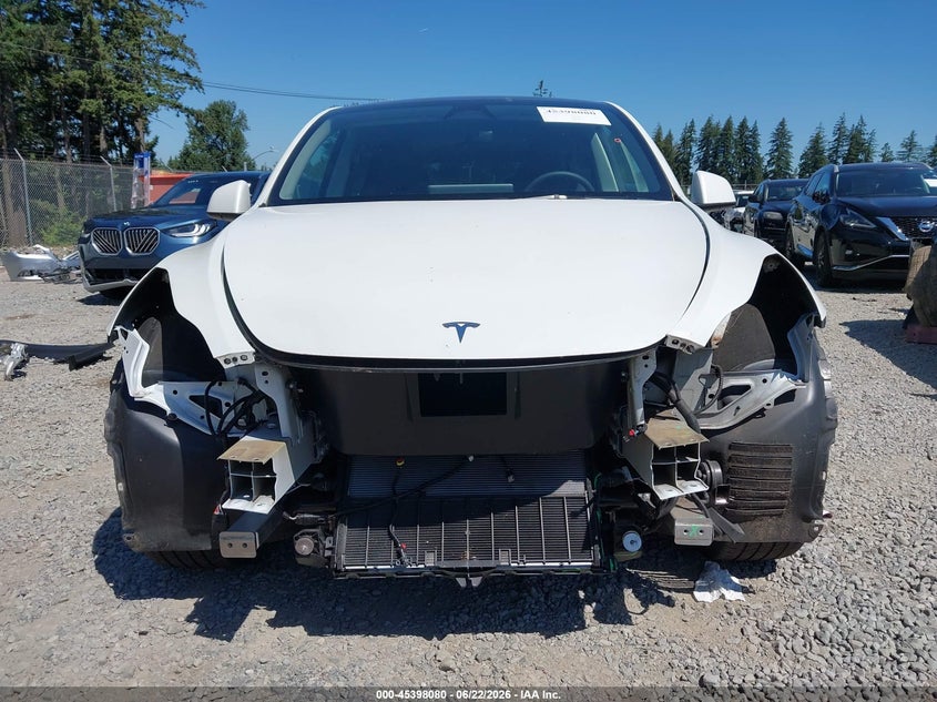2023 Tesla Model y VIN 7SAYGDEE1PF825103 IAAI salvage auction — FRONT END, Salvage Title, sold $10,700 on 2026-07-16 (photo 6)