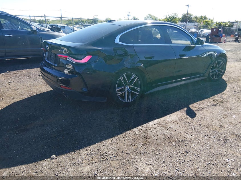 2023 BMW 4er VIN WBA73AV05PFN87837 IAAI salvage auction — REAR END, Salvage Title, sold $13,200 on 2026-08-14 (photo 4)