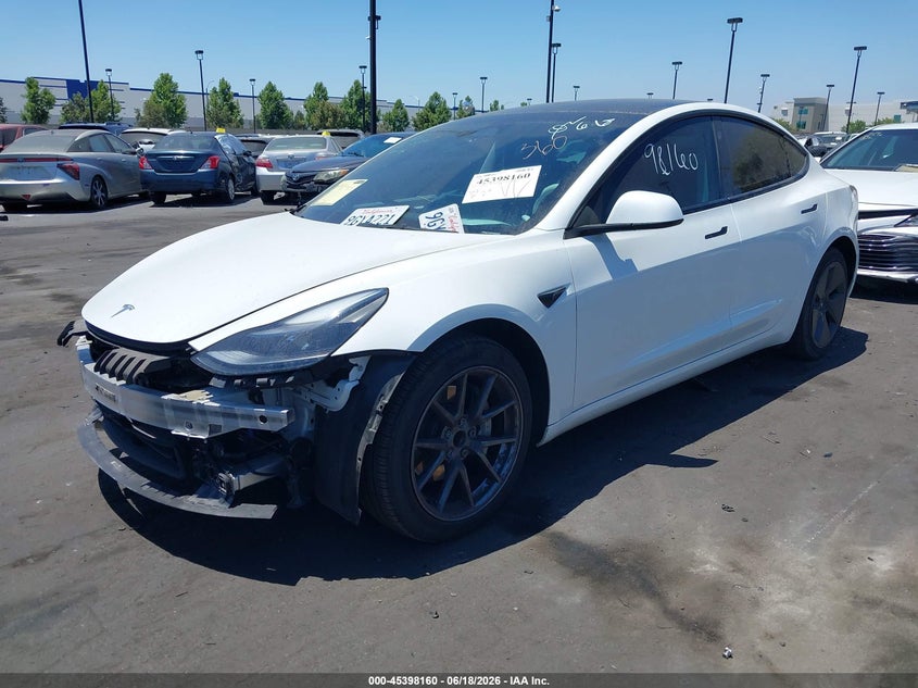 2023 Tesla Model 3 VIN 5YJ3E1EA4PF593041 IAAI salvage auction — RIGHT FRONT, Salvage Title, sold $8,950 on 2026-07-10 (photo 2)