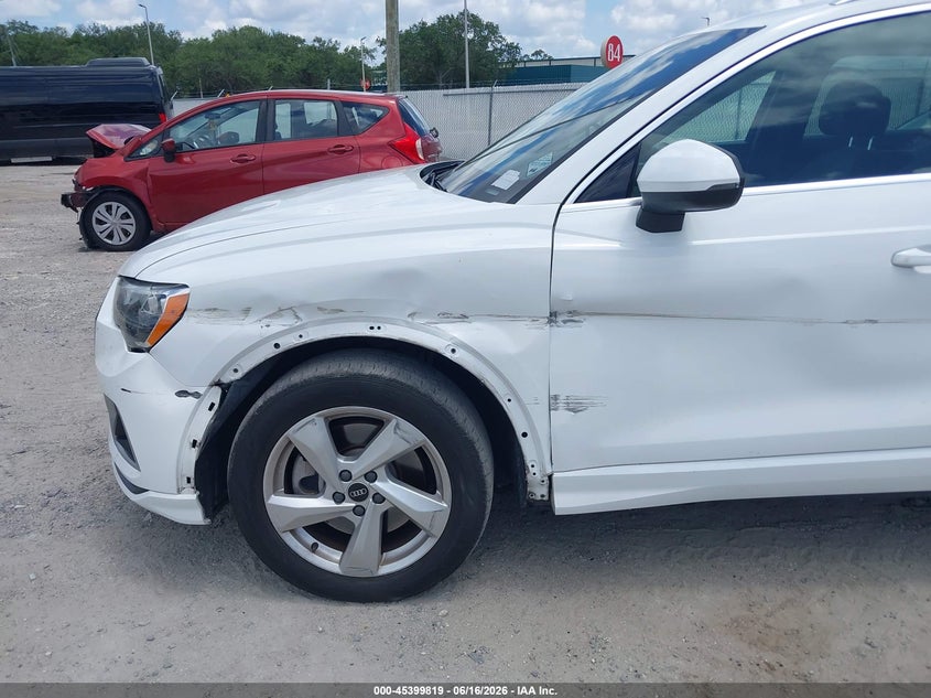 2021 Audi Q3 VIN WA1AUCF30M1089512 IAAI salvage auction — LEFT SIDE, Rebuildable (Florida), sold $4,750 on 2026-07-21 (photo 6)