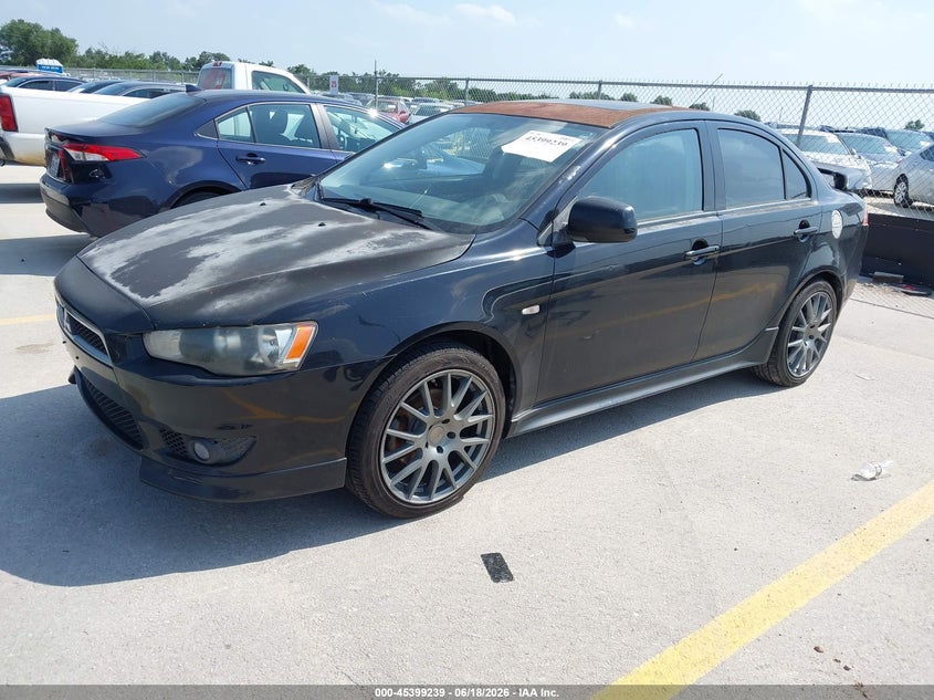 2009 Mitsubishi Lancer VIN JA3AU86W49U006908 IAAI salvage auction — NORMAL WEAR, Clear (Indiana), sold $275 on 2026-07-30 (photo 2)