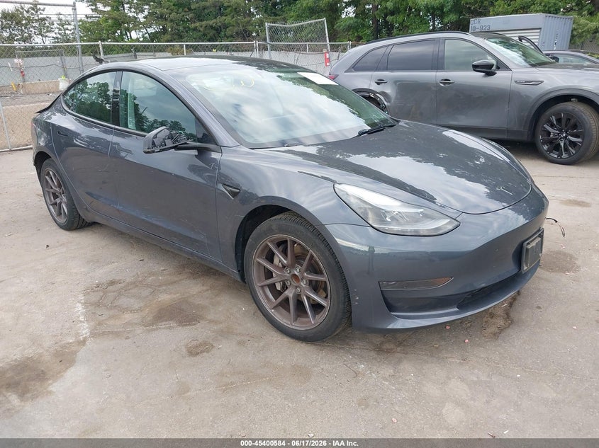 2023 Tesla Model 3 VIN 5YJ3E1EA7PF613248 IAAI salvage auction — REAR END, Mv-907A (New York), sold $8,950 on 2026-07-07 (photo 1)