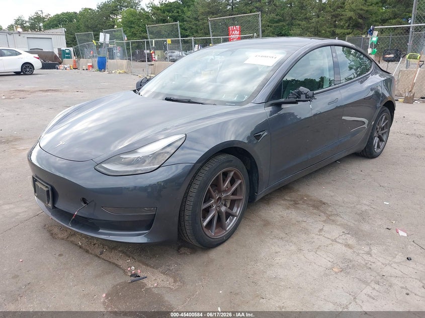 2023 Tesla Model 3 VIN 5YJ3E1EA7PF613248 IAAI salvage auction — REAR END, Mv-907A (New York), sold $8,950 on 2026-07-07 (photo 2)