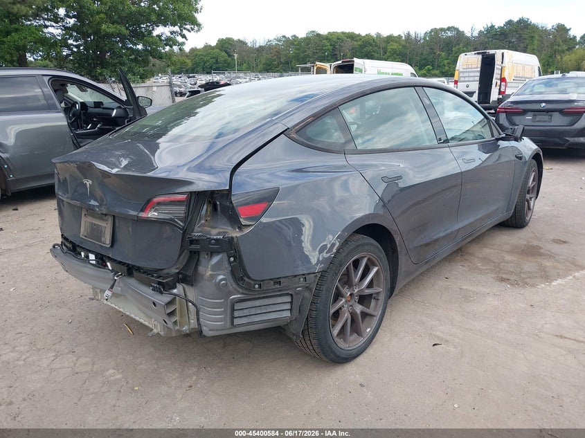 2023 Tesla Model 3 VIN 5YJ3E1EA7PF613248 IAAI salvage auction — REAR END, Mv-907A (New York), sold $8,950 on 2026-07-07 (photo 6)